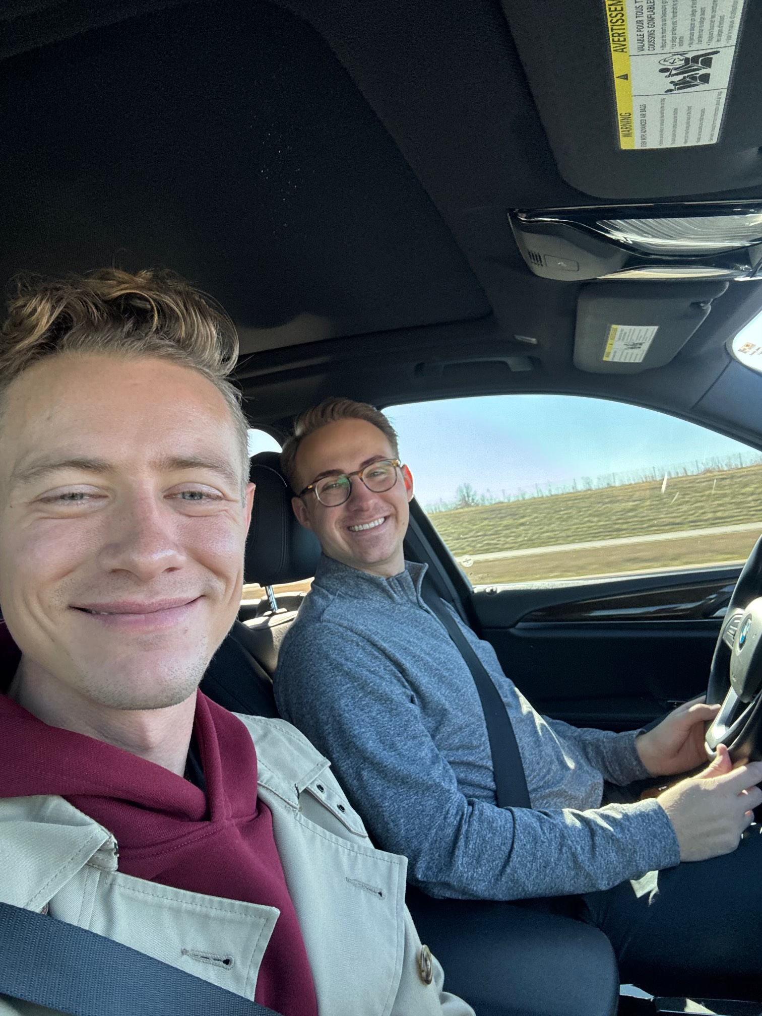 Tucker and Schol take a selfie in their car on a roadtrip