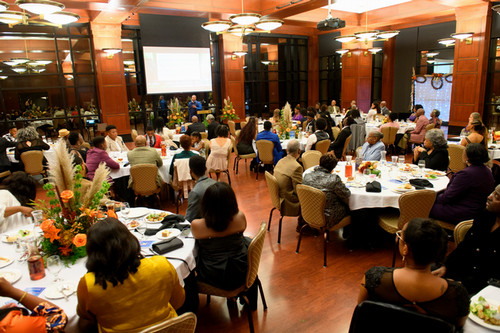 The African American Alumni Association is gathered at tables for the Sankofa Gala.